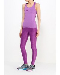 Ярко-розовые леггинсы от Nike