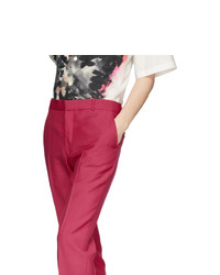 Ярко-розовые шерстяные брюки чинос от Alexander McQueen