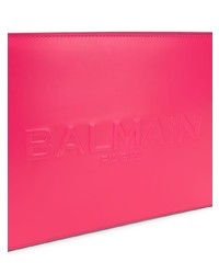 Ярко-розовый кожаный клатч от Balmain