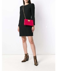 Ярко-розовый кожаный клатч от Givenchy