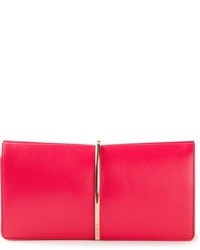 Ярко-розовый кожаный клатч от Nina Ricci