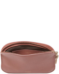 Ярко-розовый кожаный клатч от Nina Ricci